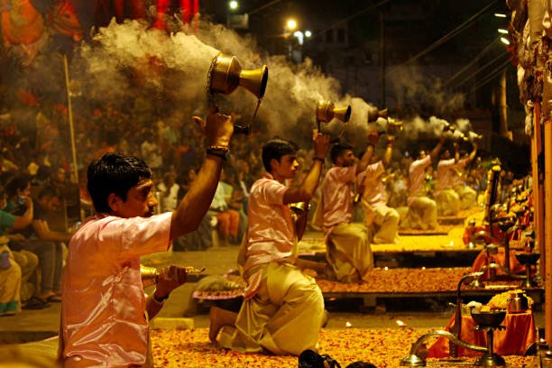 5th March 2020, Varanasi, Uttar Pradesh, India. Sadhus performing Ganga Aarti at evening time